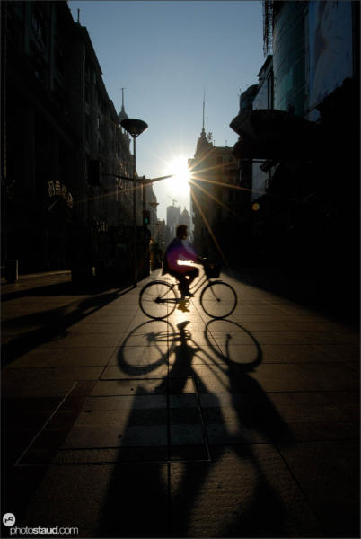Early morning cyclist in Shanghai, Shanghai, China